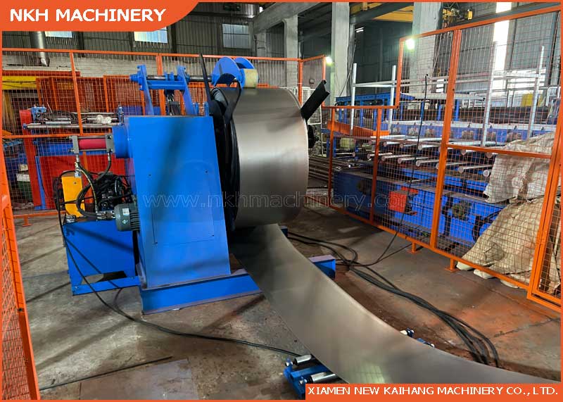 5TX600mm Hydraulic & Driven Un-Coiler with top arm