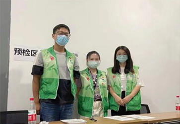 疫苗接种筑防线，志愿服务暖人心