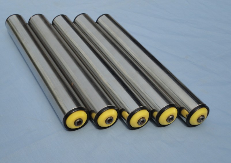 Gravity conveyor rollers with yellow plastic end caps