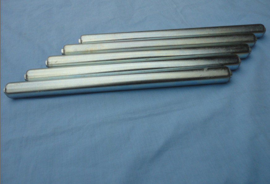 Gravity steel conveyor rollers with metal caps