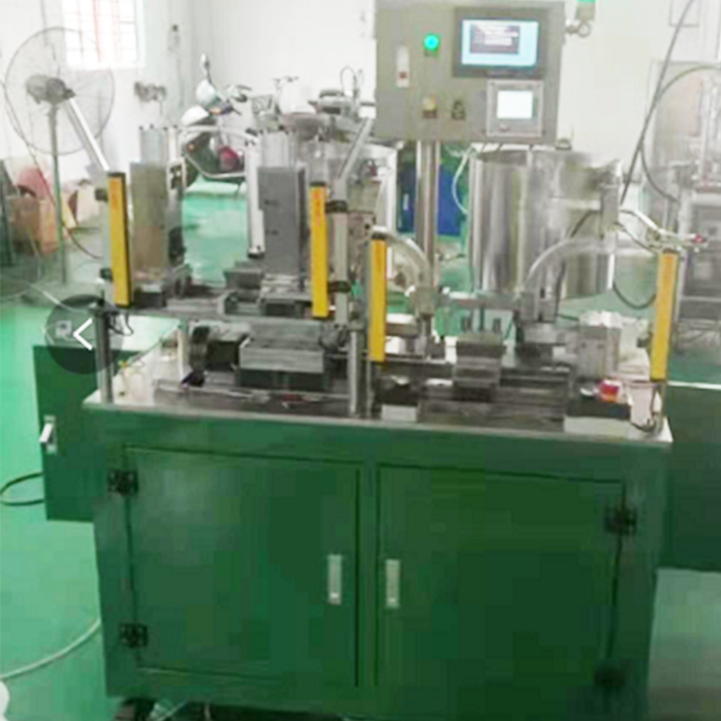 自動入軸入內卡簧機