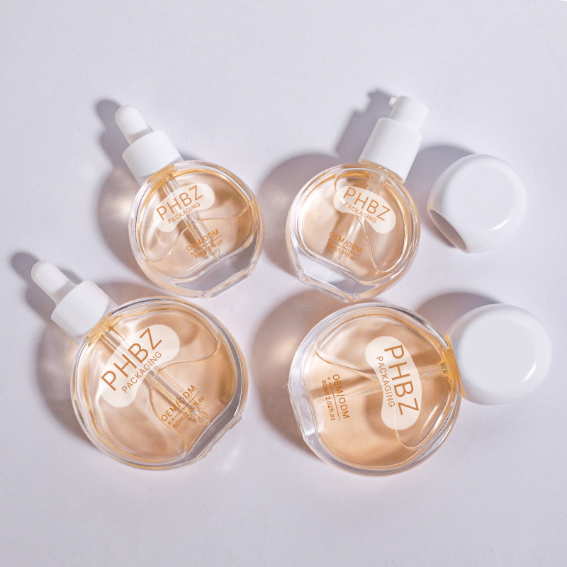 廠家定制30ml扁圓臉部精華原液瓶 玻璃精油原液滴管瓶 化妝品包材